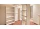 Walk-in closet with multiple shelves and hanging bars offers ample storage space at 3311 Creek Hollow Dr, Marietta, GA 30062