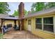 Exterior deck featuring a gazebo, outdoor seating, and access to the home's rear entrance at 3311 Creek Hollow Dr, Marietta, GA 30062