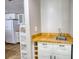 Well-appointed kitchenette featuring a sink with wood countertop and white cabinets at 3311 Creek Hollow Dr, Marietta, GA 30062