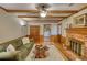 Comfortable living room with a brick fireplace, hardwood floors, and cozy seating area at 3311 Creek Hollow Dr, Marietta, GA 30062