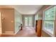 Bright sunroom with multiple windows, a cozy reading nook, and access to a private balcony at 3311 Creek Hollow Dr, Marietta, GA 30062
