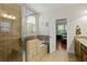 Bathroom with walk-in shower, soaking tub, and tiled floor at 436 Barnett St, Woodstock, GA 30188