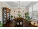 Dining room features hardwood floors, natural light, and space for hutch, dining table and chairs at 436 Barnett St, Woodstock, GA 30188