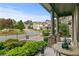 Inviting front porch with decorative columns and furnishings, offering a relaxing outdoor space overlooking the neighborhood at 436 Barnett St, Woodstock, GA 30188