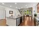 Open kitchen with center island, stainless steel dishwasher, and an eat-in area at 436 Barnett St, Woodstock, GA 30188