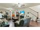 Spacious living room featuring an open floor plan and hardwood floors at 436 Barnett St, Woodstock, GA 30188
