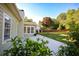 The backyard features a concrete patio with well-maintained landscaping and a spacious lawn at 47 Cliff Ct, Villa Rica, GA 30180