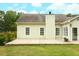 Back exterior view of the home showcasing the patio and backyard at 47 Cliff Ct, Villa Rica, GA 30180
