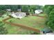 Large, flat backyard with privacy fence, patio and mature landscaping at 47 Cliff Ct, Villa Rica, GA 30180