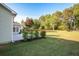The backyard features green landscaping and a spacious lawn at 47 Cliff Ct, Villa Rica, GA 30180