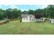 Aerial view of fenced backyard and patio at 47 Cliff Ct, Villa Rica, GA 30180