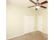 Cozy bedroom featuring neutral walls, carpet flooring, ceiling fan, and a double door closet at 47 Cliff Ct, Villa Rica, GA 30180
