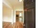 Open entryway with wood floors leads into a living space with a fireplace at 47 Cliff Ct, Villa Rica, GA 30180