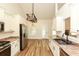 Modern kitchen with stainless steel appliances, granite countertops, and ample cabinet space at 47 Cliff Ct, Villa Rica, GA 30180