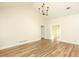 Spacious living room with hardwood floors, vaulted ceiling, and natural lighting at 47 Cliff Ct, Villa Rica, GA 30180