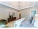 Bright bedroom with stylish decor, a tray ceiling, and ample natural light at 541 Londonberry Rd, Atlanta, GA 30327
