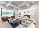 Bright, open living space with a seamless transition to the outdoors and view into the kitchen at 541 Londonberry Rd, Atlanta, GA 30327