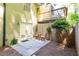 Backyard patio with outdoor seating, fenced yard, and a double door entrance at 6109 Park Ave, Atlanta, GA 30342