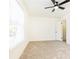 Bedroom with a ceiling fan, window with blinds, and neutral carpeting at 6109 Park Ave, Atlanta, GA 30342