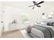 Serene bedroom with a neutral palette, dresser, comfortable bed and natural light at 6109 Park Ave, Atlanta, GA 30342