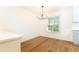 Bright dining area featuring a modern chandelier and wood floors at 6109 Park Ave, Atlanta, GA 30342