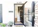Inviting entryway showcasing the front door leading to a staircase and hardwood floors at 6109 Park Ave, Atlanta, GA 30342