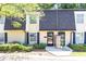 Charming townhome exterior with well-maintained landscaping and visible unit numbers above the doors at 6109 Park Ave, Atlanta, GA 30342