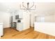 Open concept kitchen featuring stainless steel appliances and hardwood flooring at 6109 Park Ave, Atlanta, GA 30342
