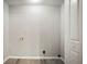 Practical laundry room with new vinyl floors and convenient washer hookups at 6549 Biscayne Way, Douglasville, GA 30135