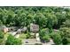 An aerial view of a beautiful home nestled in a lush, green neighborhood with mature trees and landscaping at 171 Beverly Ne Rd, Atlanta, GA 30309