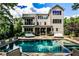 Gorgeous backyard featuring a refreshing pool, sun loungers, and manicured gardens at 171 Beverly Ne Rd, Atlanta, GA 30309