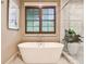 Lovely bathroom featuring a standalone tub and modern walk-in shower at 171 Beverly Ne Rd, Atlanta, GA 30309