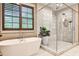 Elegant bathroom with freestanding tub and a walk-in glass shower at 171 Beverly Ne Rd, Atlanta, GA 30309