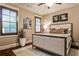 Comfortable bedroom with hardwood floors, neutral walls, and a luxurious upholstered bed frame at 171 Beverly Ne Rd, Atlanta, GA 30309