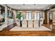 Elegant dining room with wood floors, stylish chandelier, and custom cabinets at 171 Beverly Ne Rd, Atlanta, GA 30309