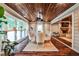 Bright dining area with wood ceiling, lots of windows, hardwood floors, and seamlessly opening up to the kitchen at 171 Beverly Ne Rd, Atlanta, GA 30309