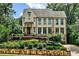 Inviting two-story home with manicured landscaping and stone accents on the front exterior at 171 Beverly Ne Rd, Atlanta, GA 30309
