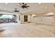 Spacious garage with multiple parking spaces, ceiling fans, and carriage house doors at 171 Beverly Ne Rd, Atlanta, GA 30309