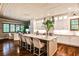 Open kitchen with oversized island, marble countertops, stainless appliances, and a breakfast nook at 171 Beverly Ne Rd, Atlanta, GA 30309