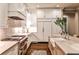 Well-equipped kitchen featuring professional-grade appliances, marble countertops and a large island at 171 Beverly Ne Rd, Atlanta, GA 30309