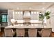 Elegant kitchen with oversized island, stainless steel range, custom cabinetry and barstool seating at 171 Beverly Ne Rd, Atlanta, GA 30309