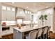 Modern kitchen with stainless steel appliances, stone countertops, and a large island with seating at 171 Beverly Ne Rd, Atlanta, GA 30309