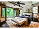 Tranquil bedroom with balcony access, offering a serene retreat with natural light and stylish decor at 171 Beverly Ne Rd, Atlanta, GA 30309