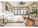Airy main bedroom with a ceiling fan, lots of natural light, and hardwood floors at 171 Beverly Ne Rd, Atlanta, GA 30309