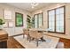 Home office with natural light, custom plantation shutters, hardwood floors, and neutral color palette at 171 Beverly Ne Rd, Atlanta, GA 30309