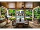 Well-equipped outdoor kitchen and dining area, perfect for al fresco meals and entertaining by the pool at 171 Beverly Ne Rd, Atlanta, GA 30309