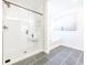 Modern bathroom featuring a glass shower, soaking tub, and contemporary finishes at 1735 Fulmont Cir, Mableton, GA 30126