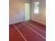 Bright, airy bedroom with a large window, freshly painted walls, and new floor coverings at 1735 Fulmont Cir, Mableton, GA 30126