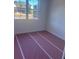 Sunlit bedroom with large window showcasing neighborhood view and blank canvas for personalization at 1735 Fulmont Cir, Mableton, GA 30126