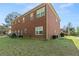 Exterior of home, showing the brick, backyard, and patio furniture at 1905 Buford Ct, Conyers, GA 30094